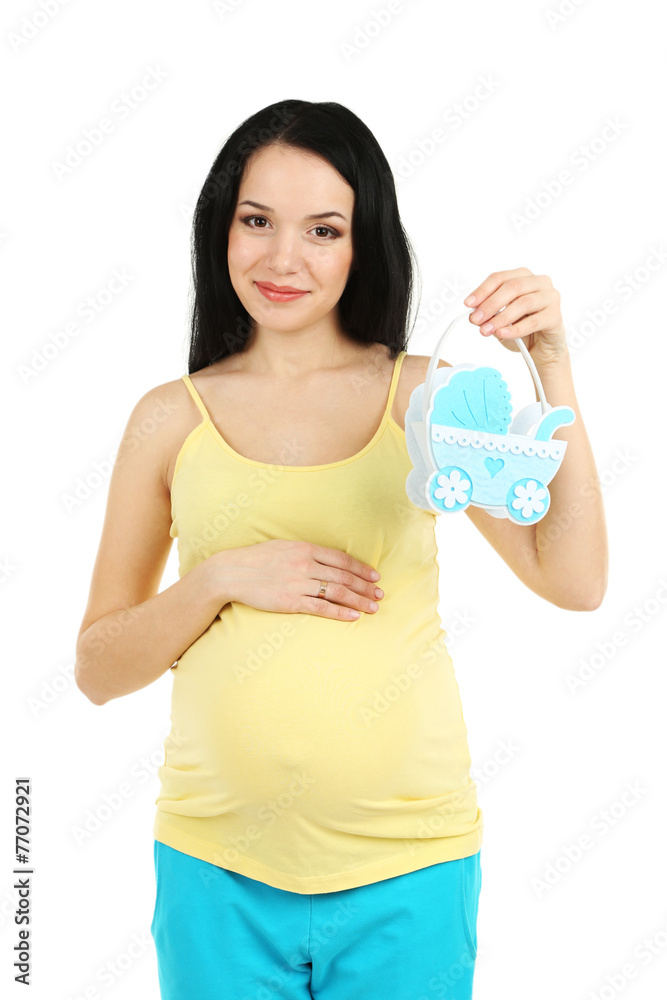 Beautiful young pregnant with baby toy isolated on white Beautiful young pregnant with baby toy isolated on white