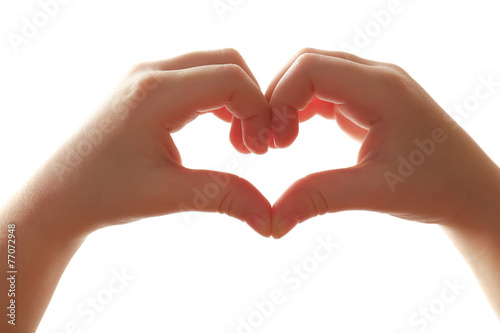 Heart shaped by child hands isolated on white