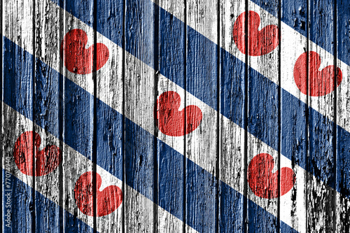flag of Friesland painted on wooden frame photo