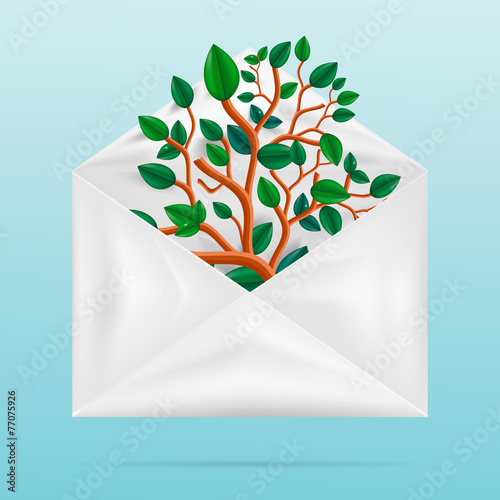 Eco concept. Green tree in paper envelope.