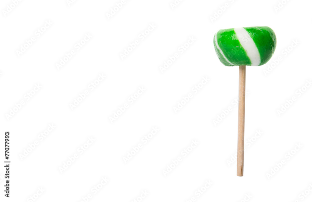 Green swirl peppermint candies over white background Green swirl peppermint candies over white background