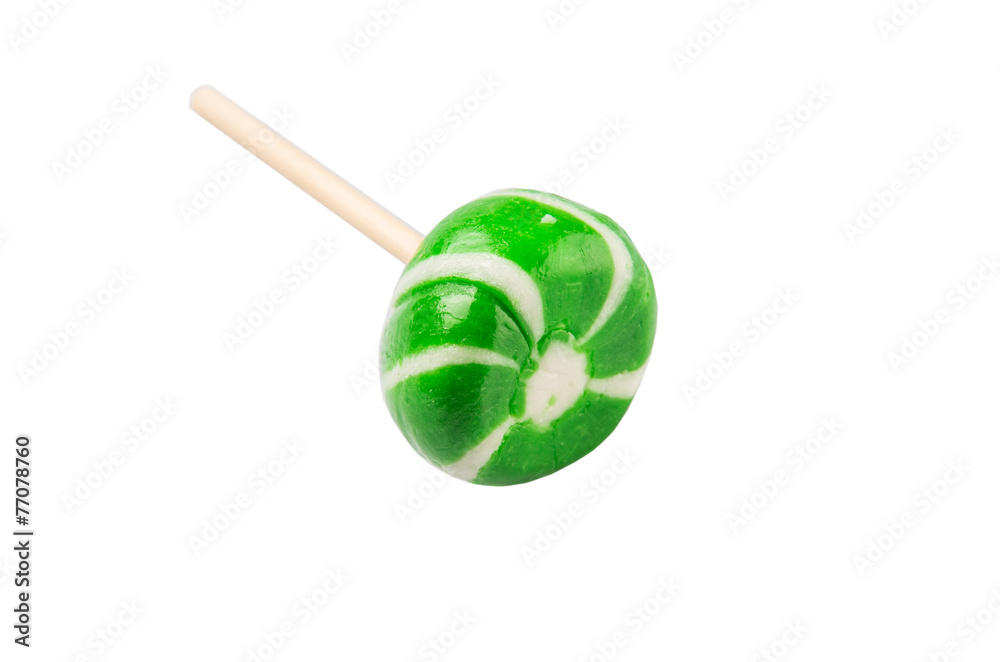 Green swirl peppermint candies over white background Green swirl peppermint candies over white background