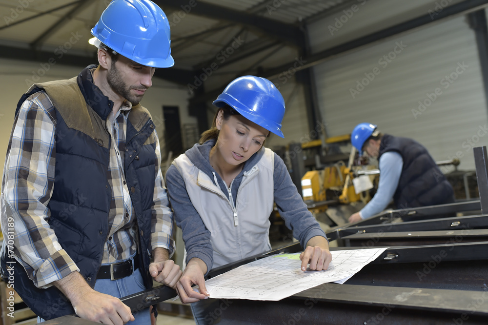 Industrial people meeting together in factory Industrial people meeting together in factory