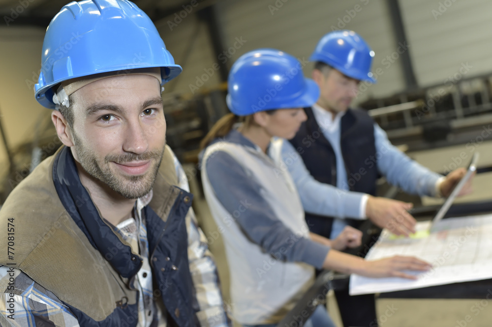 Portrait of cheerful industrial engineer Portrait of cheerful industrial engineer