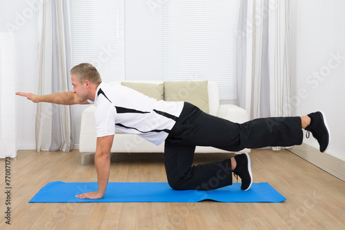 Healthy Young Man Exercising