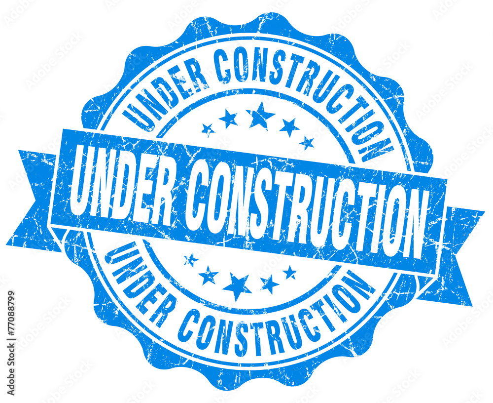 Fototapeta premium under construction blue grunge seal isolated on white