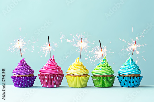 Colorful cupcakes with sparklers