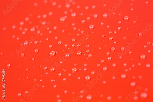 Drops of water on blue background