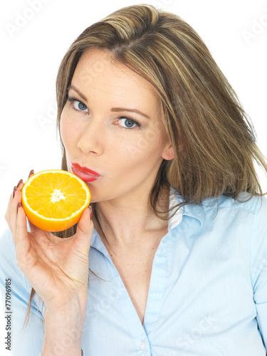 Young Woman Holding an Orange
