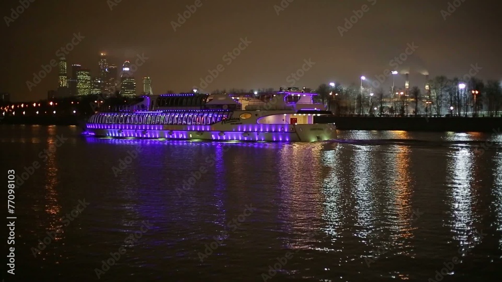 River ship in the evening in the city River ship in the evening in the city