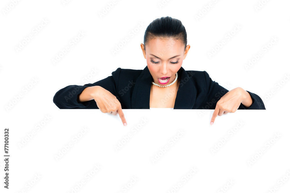 Asian businesswoman showing empty white board Asian businesswoman showing empty white board