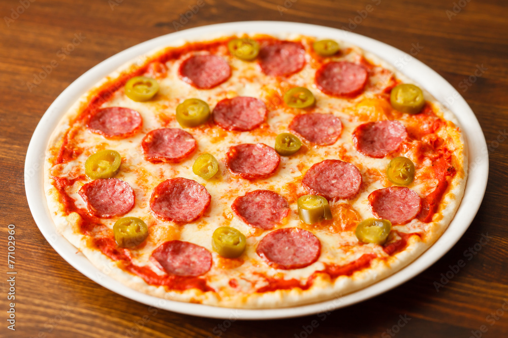 pizza on wood background pizza on wood background