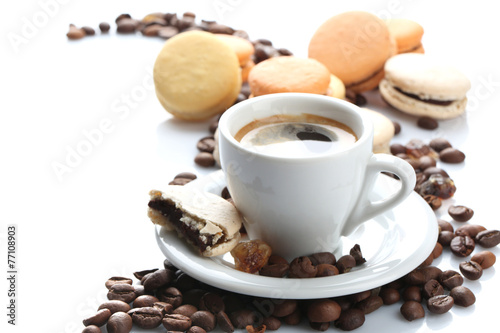 Gentle colorful macaroons and black coffee in mug isolated