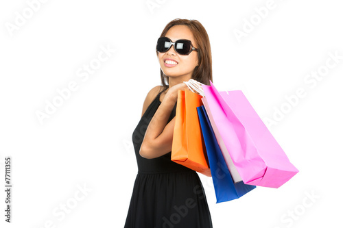 Asian Shopping Bags Flung Over Shoulder Look Away