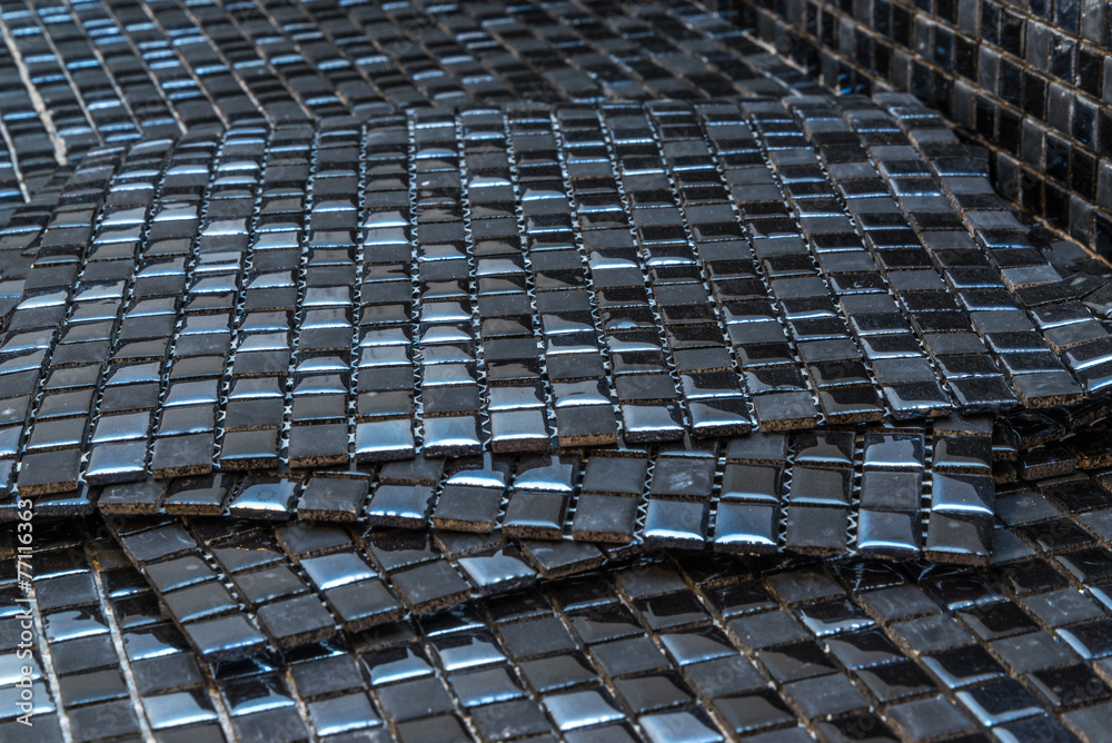 Fototapeta premium Black mosaic tiles
