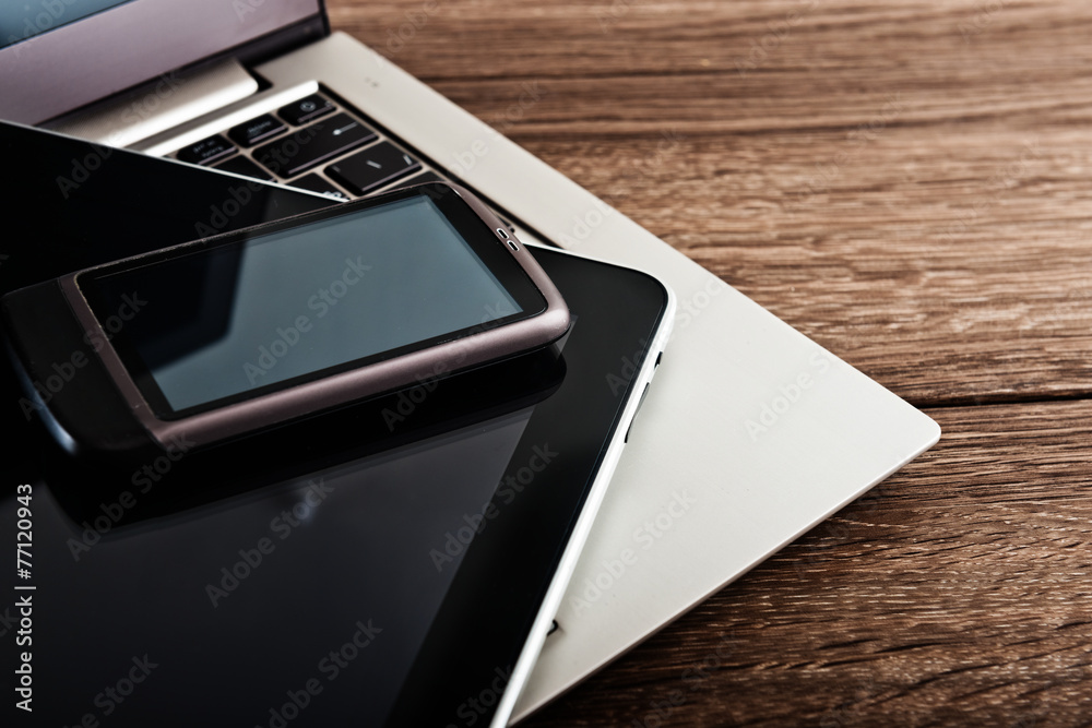 keyboard with phone and tablet pc on wooden desk keyboard with phone and tablet pc on wooden desk