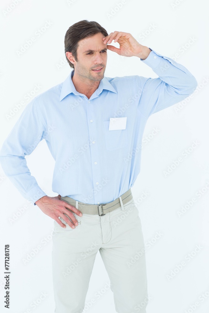 Businessman with hand on hip looking away Businessman with hand on hip looking away