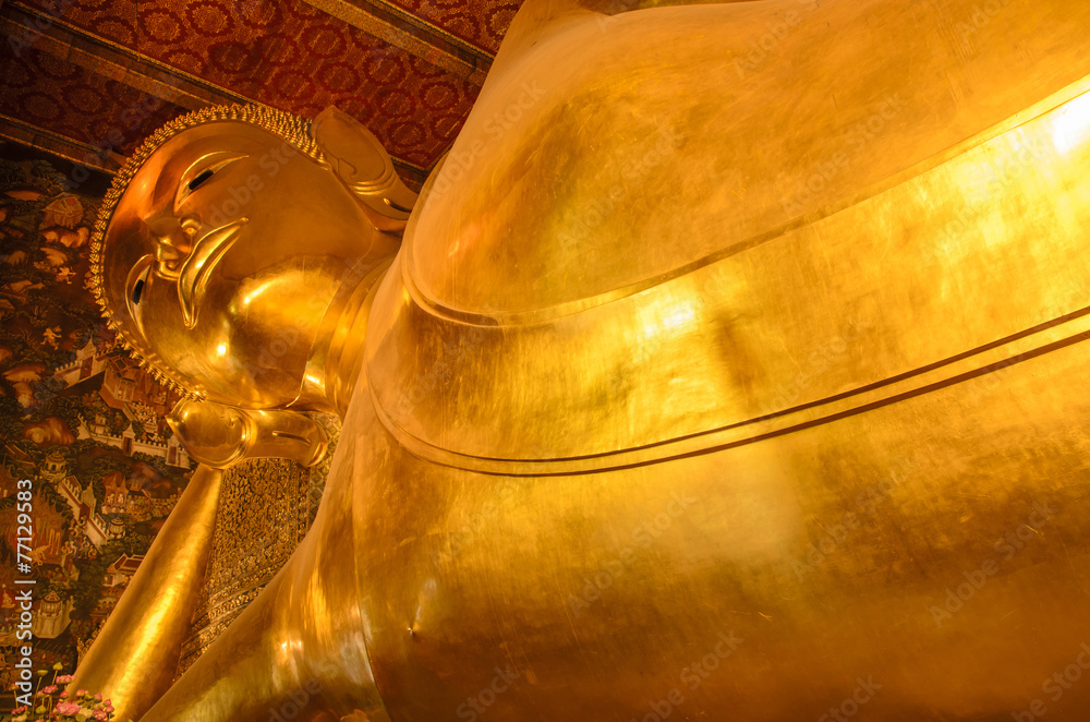 Reclining of gold buddha
