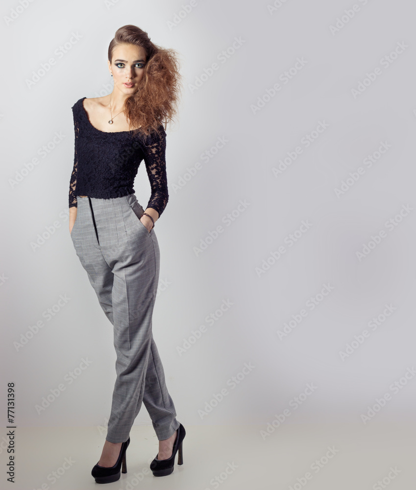 girl in pants and black t-shirt in style of the business make-up girl in pants and black t-shirt in style of the business make-up
