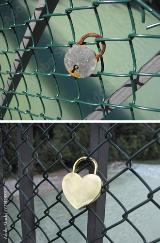 The padlock as a symbol of love is hanging on the railing of a b