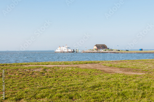 Vászonkép Ferry at the pier on the Hallig Langeness in North Frisia
