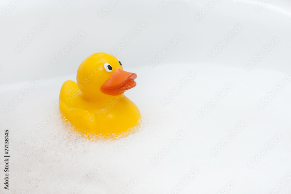 Rubber duck in foam bath Rubber duck in foam bath