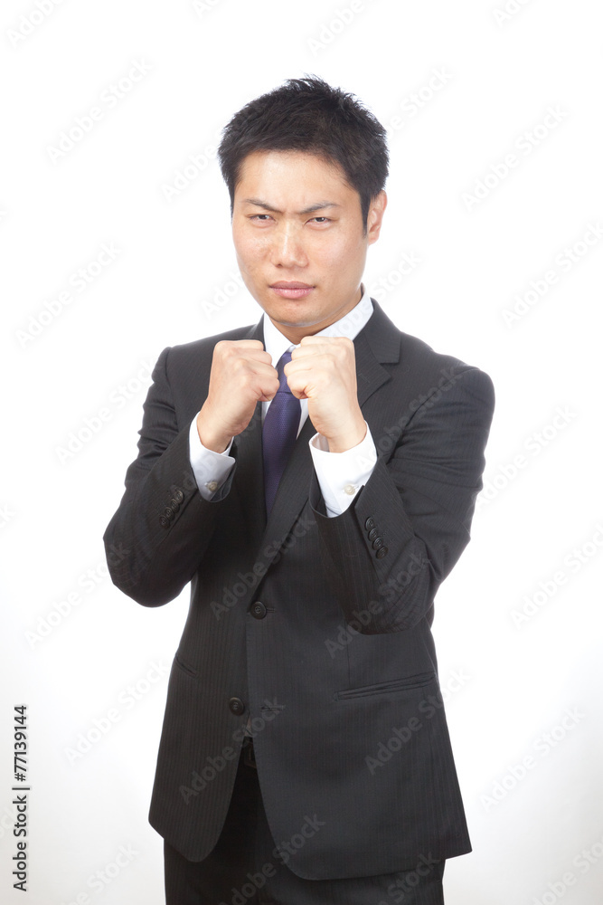 ファイティングポーズ／男性ビジネスマン