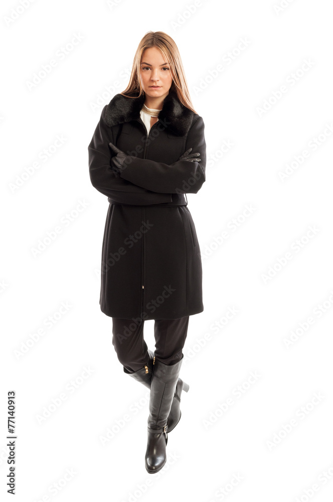 Young and beautiful female model wearing elegant black coat Young and beautiful female model wearing elegant black coat