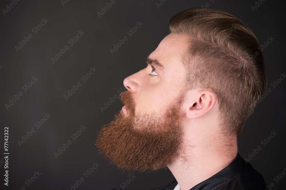 Fototapeta premium Stylish man with beard looking up