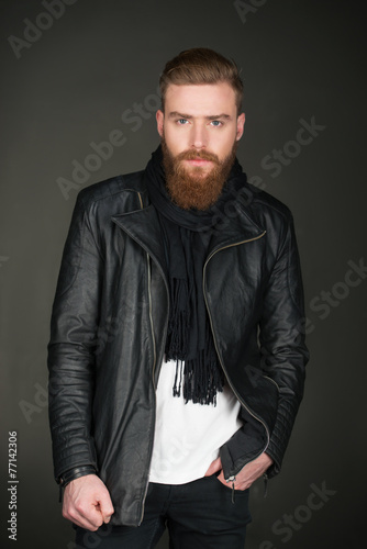 Casual man with beard wearing leather jacket