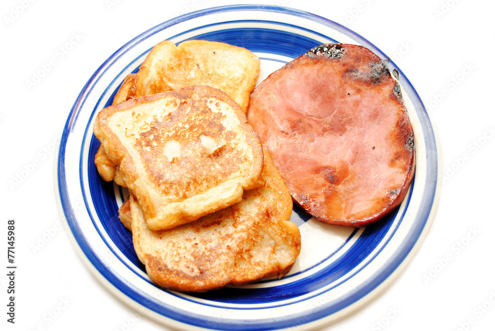 French Toast Served with a Slice of Breakfast Ham French Toast Served with a Slice of Breakfast Ham