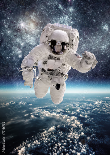 Astronaut in outer space #77146752