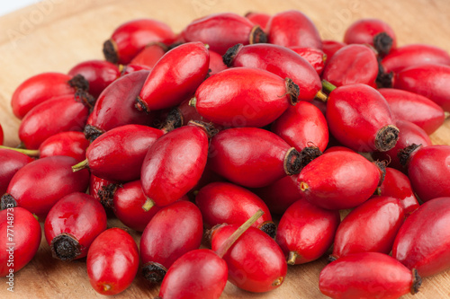 Pile of red Rose Hips - Stock Image