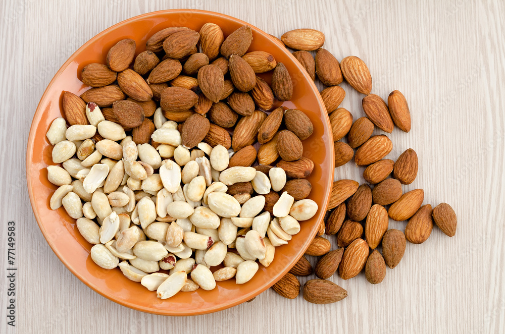 almonds and peanut in a plate