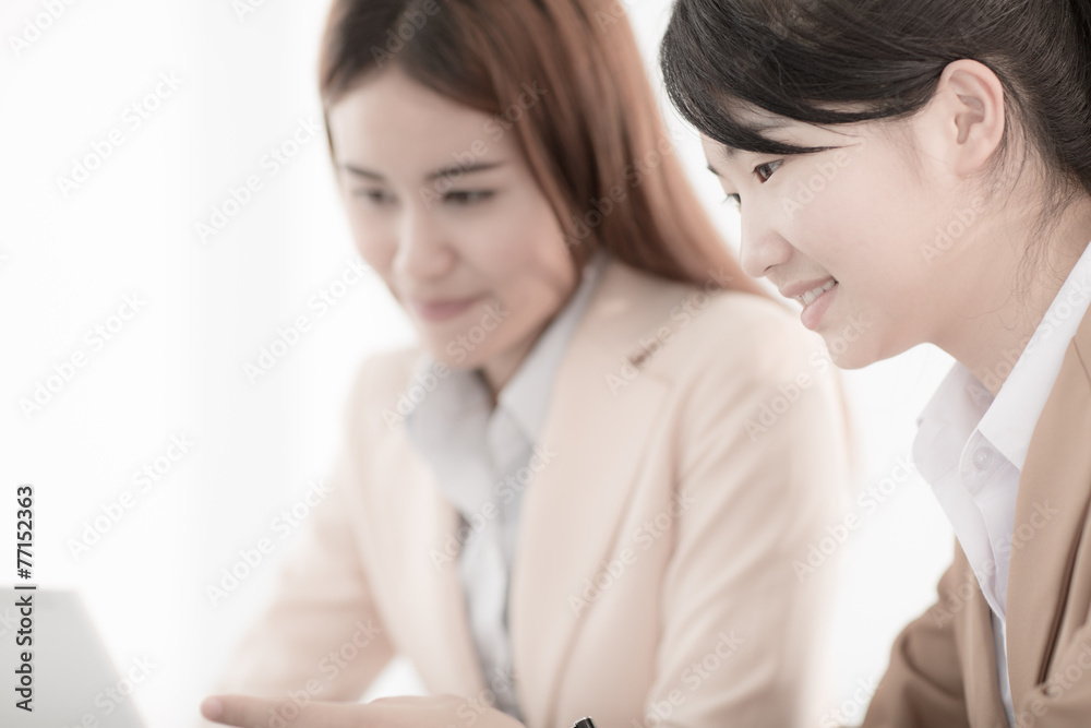Business people discussing the charts and graphs showing the res Business people discussing the charts and graphs showing the res