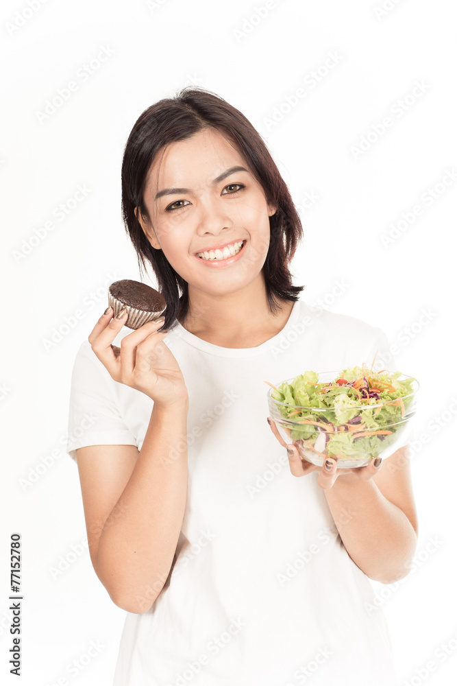 Pretty girl eating fresh vegetable salad Pretty girl eating fresh vegetable salad