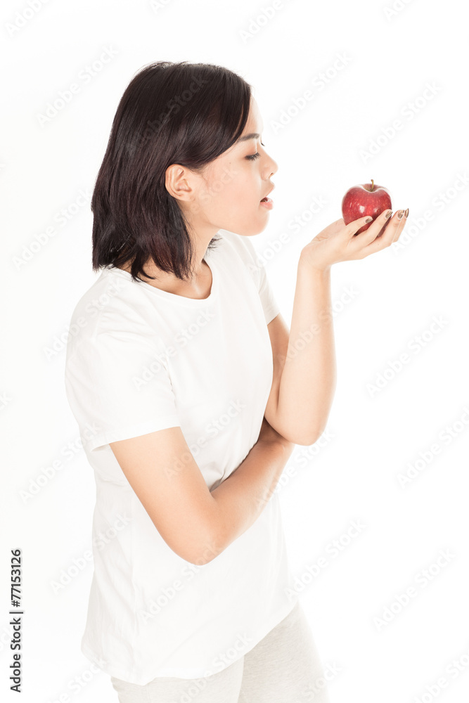 Smiling woman with apple isolated on white Smiling woman with apple isolated on white