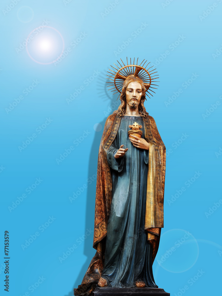 jesus christ statue and blue background