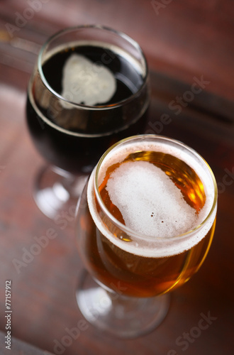 Two glasses of beer in a case