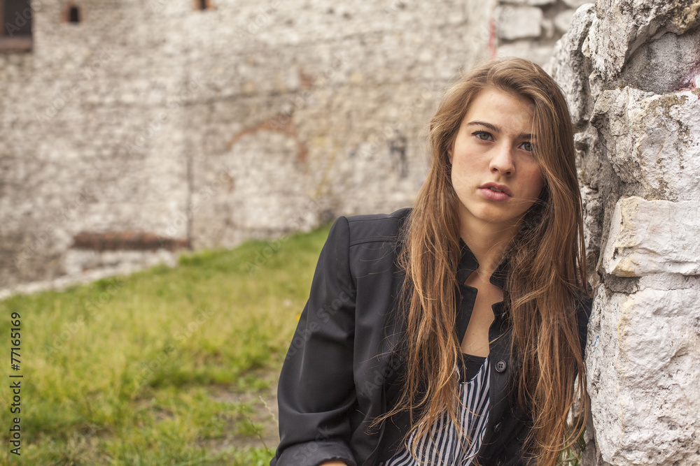 Fashionable young beautiful girl outdoors.