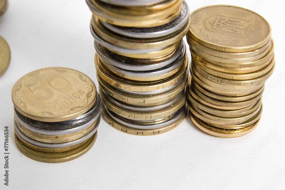 Columns of coins isolated on white background Columns of coins isolated on white background