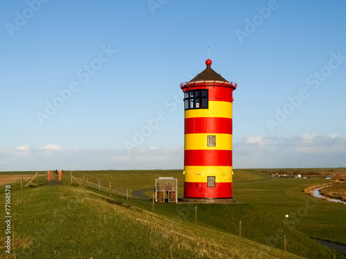 Pilsum  lighthouse at North sea of Germany.