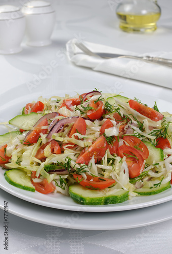 Cabbage salad with cucumber and tomatoes