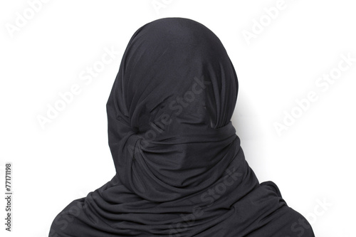 Woman totally covered by a burqa photo