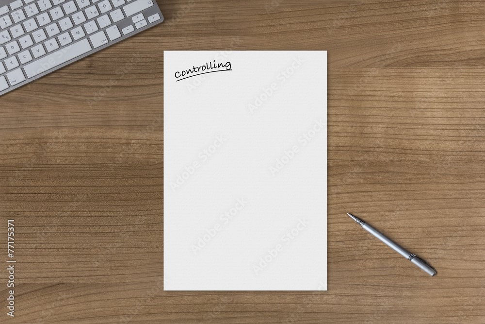Blank sheet Controlling on a wooden table Blank sheet Controlling on a wooden table