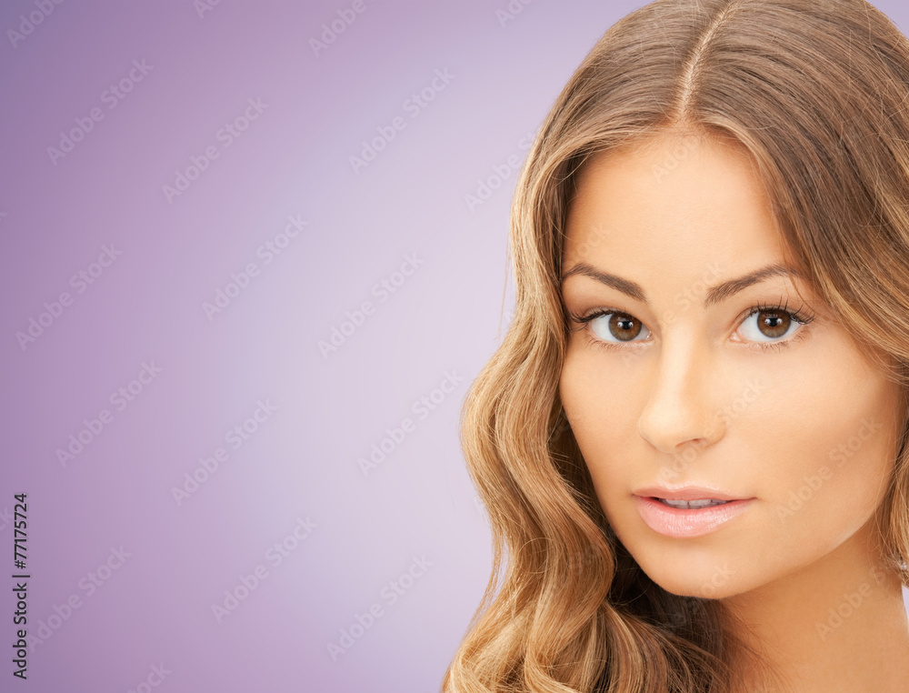 Naklejka premium beautiful young woman face