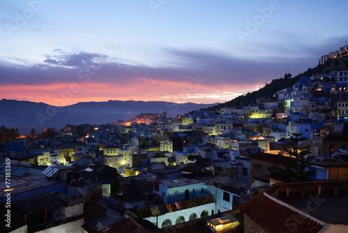 Morocco. Blue medina of Chefchaouen city at sunset photo