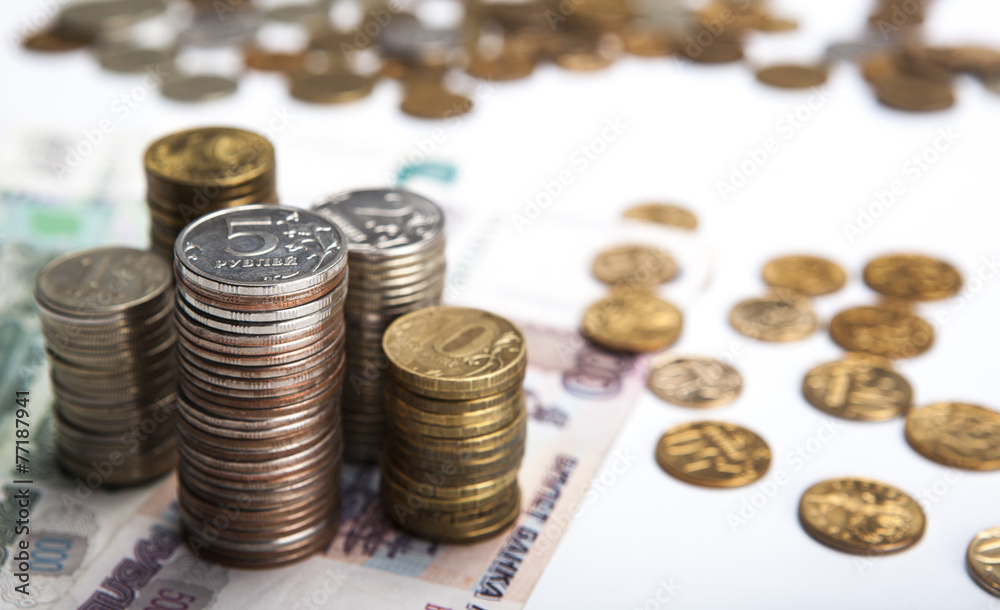 stacks of Russian rubles with note