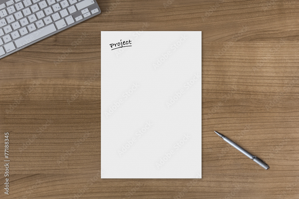 Blank sheet Project on a wooden table Blank sheet Project on a wooden table