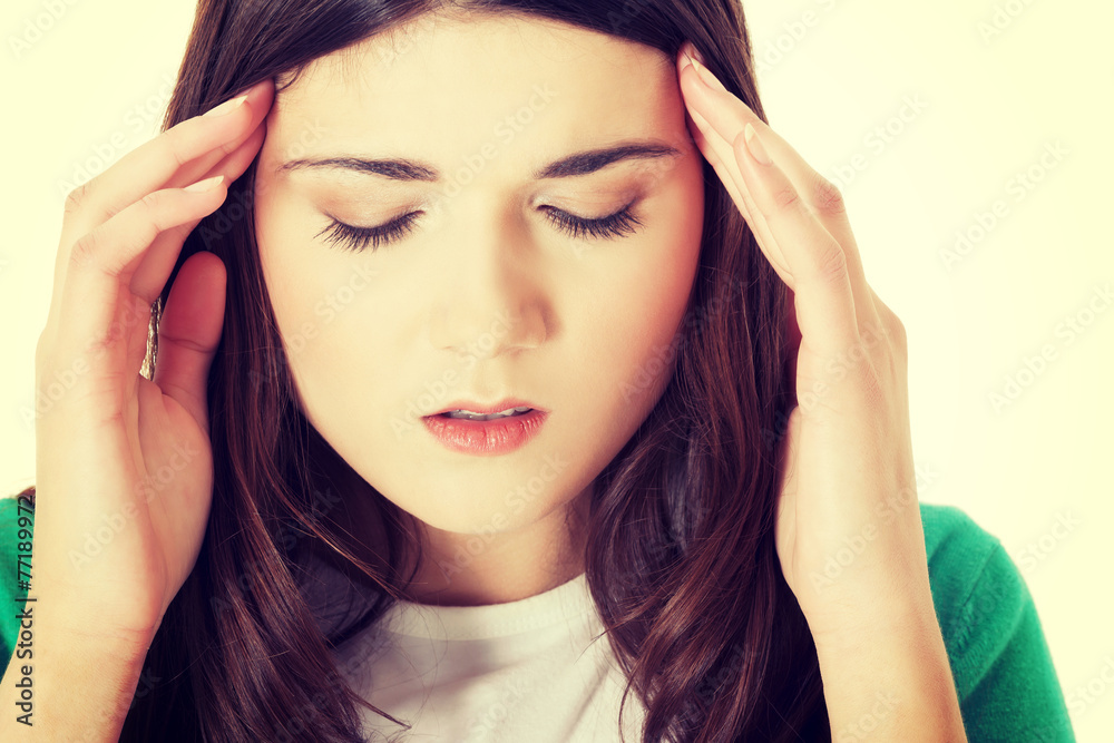 Young casual woman is having headache. Young casual woman is having headache.